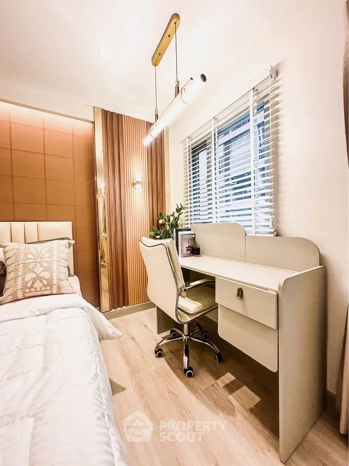 Stylish bedroom with modern study area and elegant decor