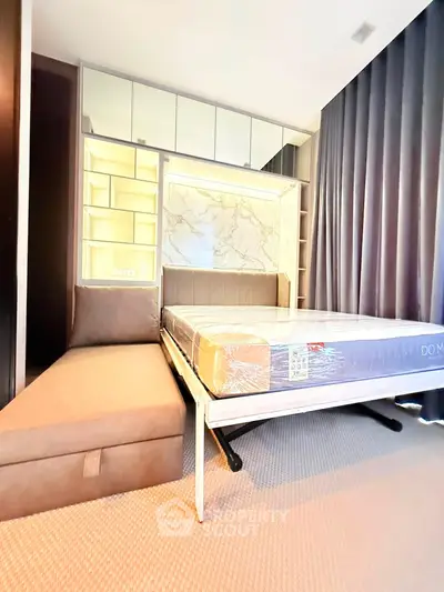 Modern bedroom with stylish decor and comfortable bed in a luxurious apartment.