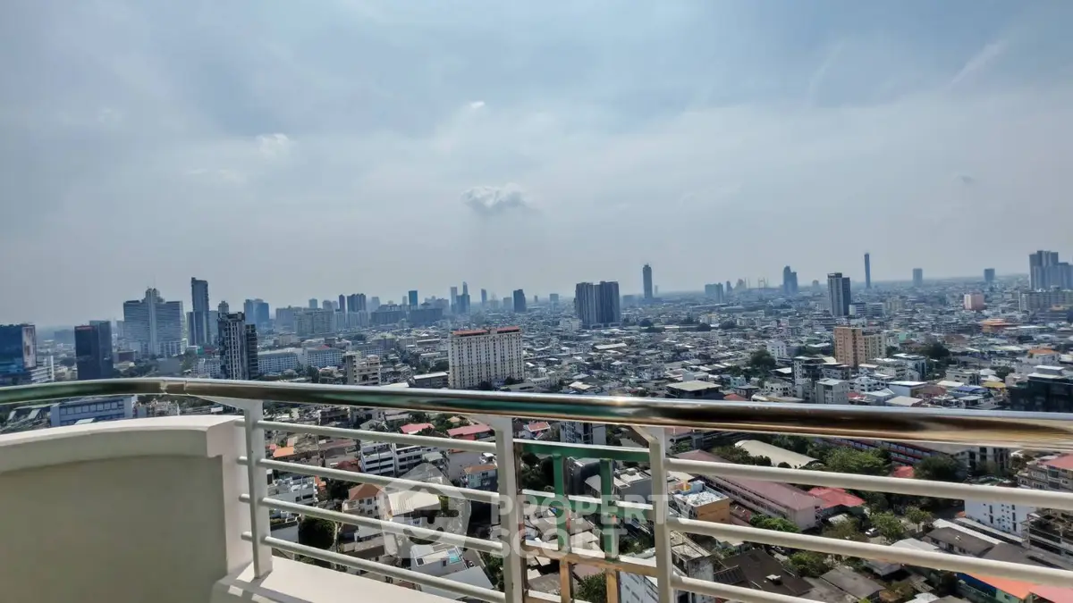 Stunning cityscape view from a high-rise balcony, perfect for urban living enthusiasts.