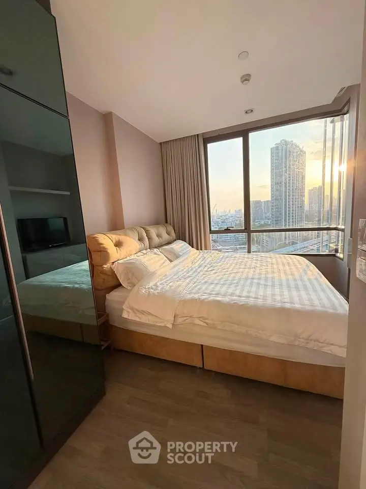 Modern bedroom with stunning city view and elegant furnishings