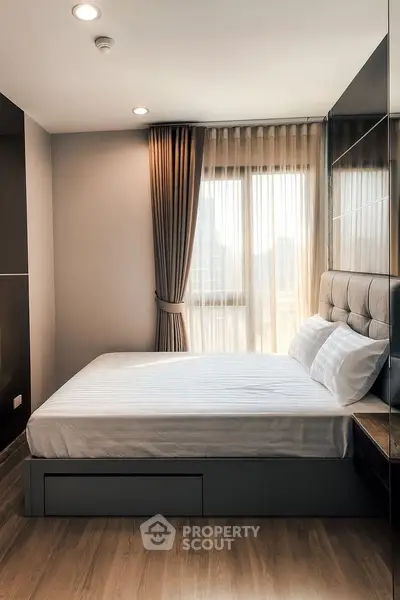 Modern bedroom with elegant decor and natural light