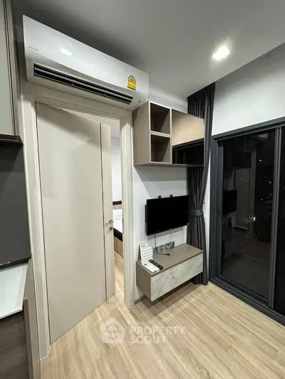 Modern apartment interior with sleek design and wooden flooring