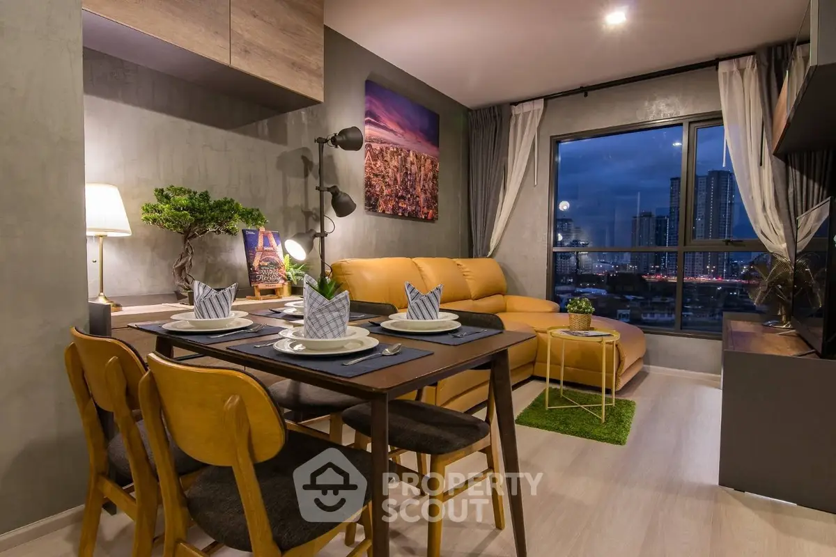 Stylish living room with city view, modern decor, and cozy dining area.