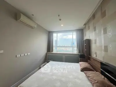 Modern bedroom with city view and air conditioning in high-rise apartment