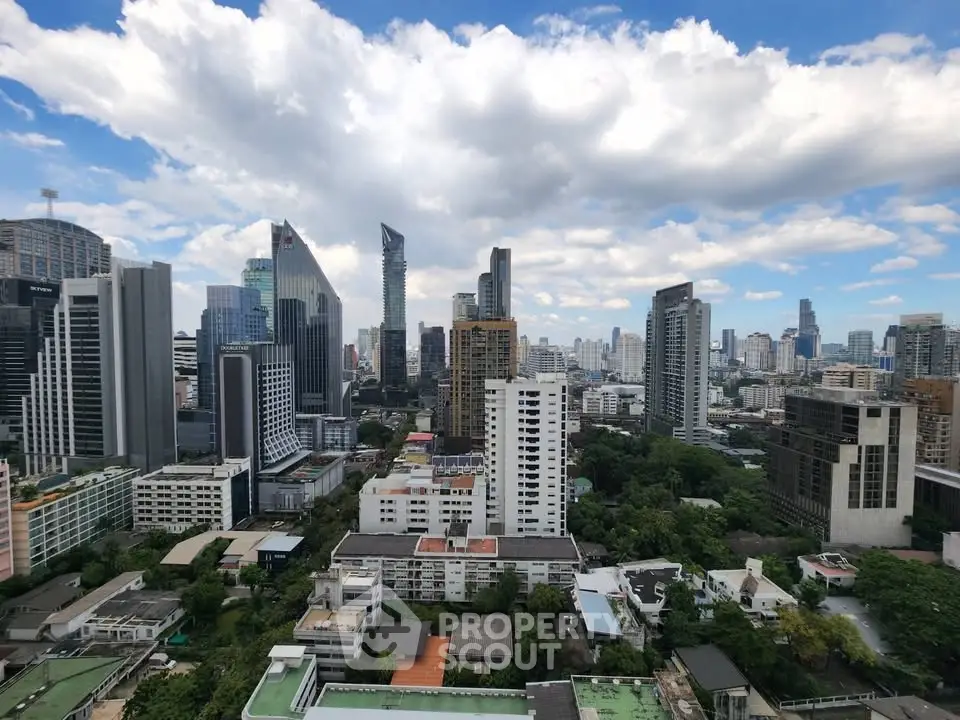 Stunning cityscape view showcasing modern skyscrapers and lush greenery, perfect for urban living enthusiasts.