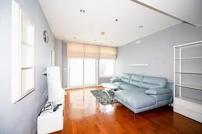 Spacious living room with modern furniture and natural light