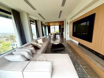Luxurious modern living room with panoramic windows and elegant decor