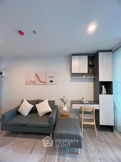 Modern living room with stylish decor and cozy seating area