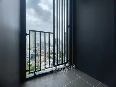 Modern balcony with cityscape view in high-rise apartment
