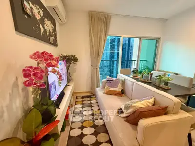 Chic living room with modern decor and balcony view in urban apartment