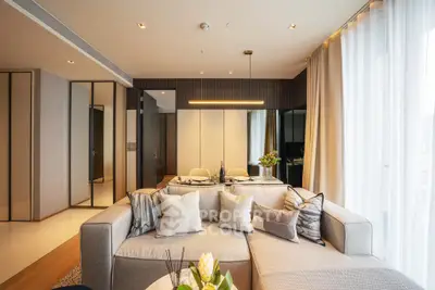 Luxurious modern living room with stylish decor and ample natural light