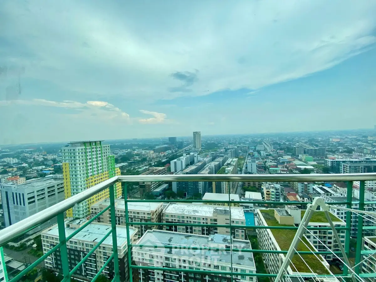Stunning high-rise cityscape view from a modern balcony, perfect for urban living.