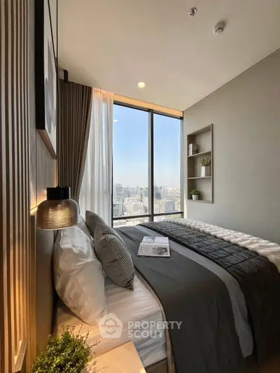 Modern bedroom with panoramic city view and stylish decor