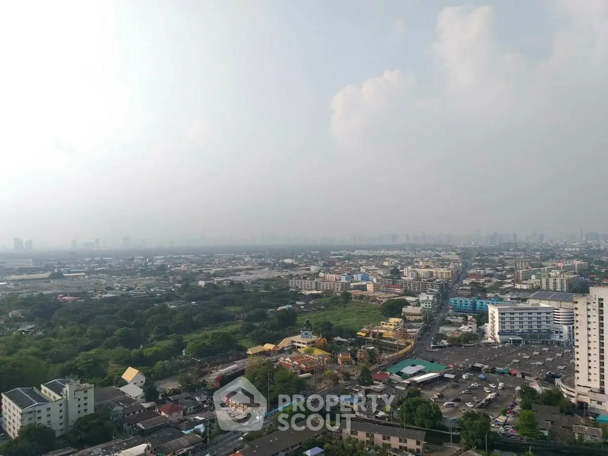 Stunning panoramic cityscape view from high-rise building showcasing urban landscape and skyline.