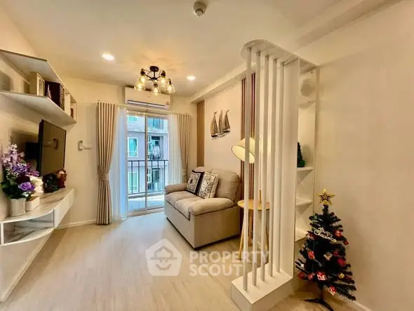 Cozy living room with modern decor and small balcony access