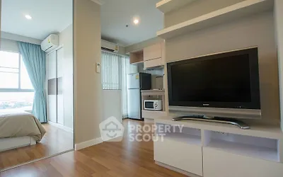 Modern apartment interior with cozy living room and kitchen area