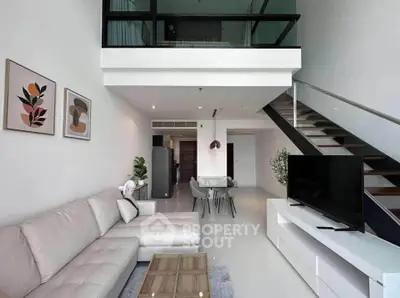 Modern duplex living room with sleek design and stylish furniture