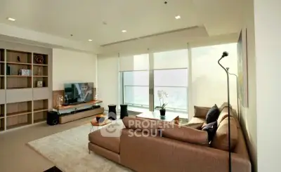 Spacious modern living room with large windows and stylish decor