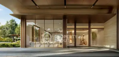 Luxurious modern building entrance with sleek design and lush greenery