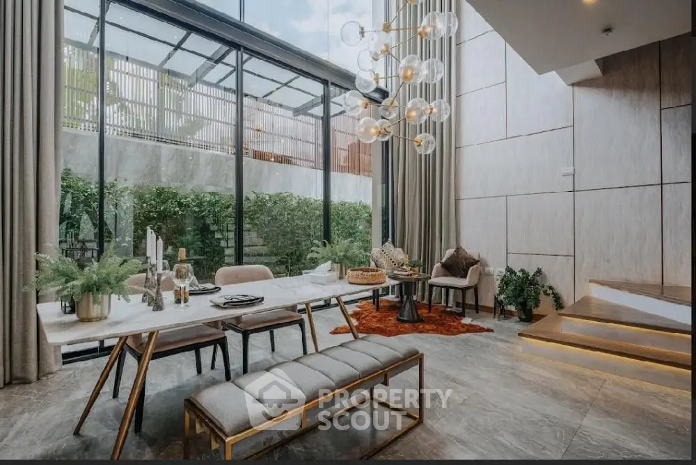 Luxurious modern living room with high ceilings and elegant decor