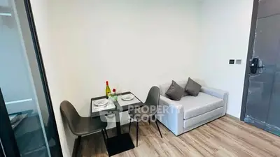 Cozy modern living room with dining area and stylish furniture