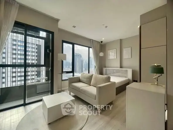 Modern studio apartment with stunning city view and stylish interior design.