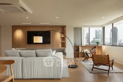 Spacious modern living room with city view and elegant decor