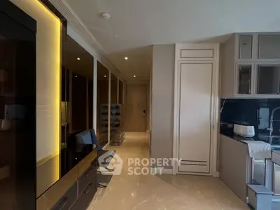 Modern kitchen with sleek cabinetry and integrated appliances