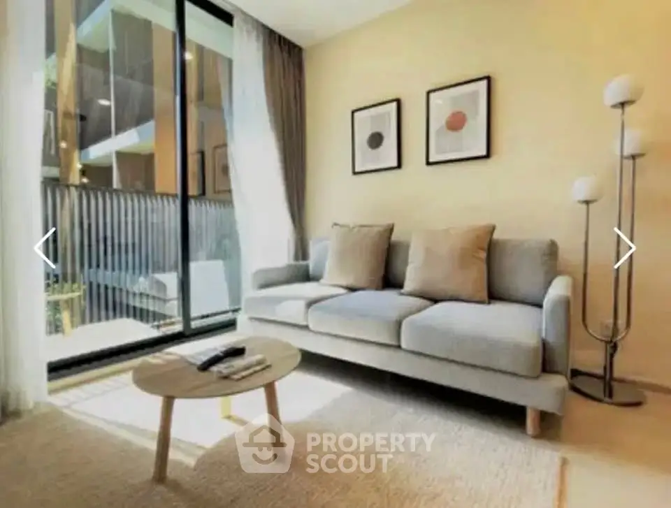 Bright and modern living room with cozy sofa and natural light