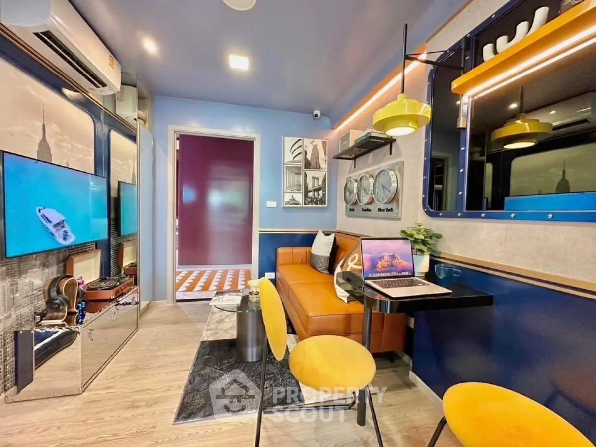 Modern living room with vibrant decor and stylish furniture