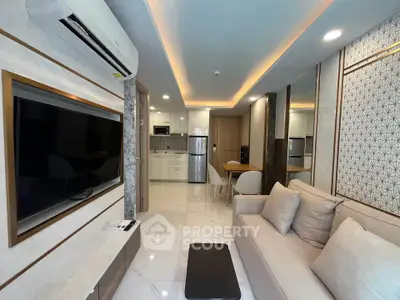 Modern living room with sleek design and open kitchen layout