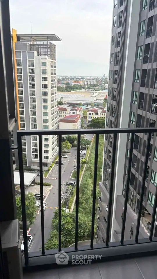 Stunning cityscape view from a modern high-rise balcony, perfect for urban living.
