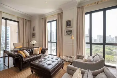 Luxurious living room with elegant furniture and stunning city view, perfect for sophisticated urban living.