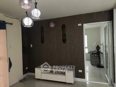 Modern living room with stylish lighting and unique wall decor