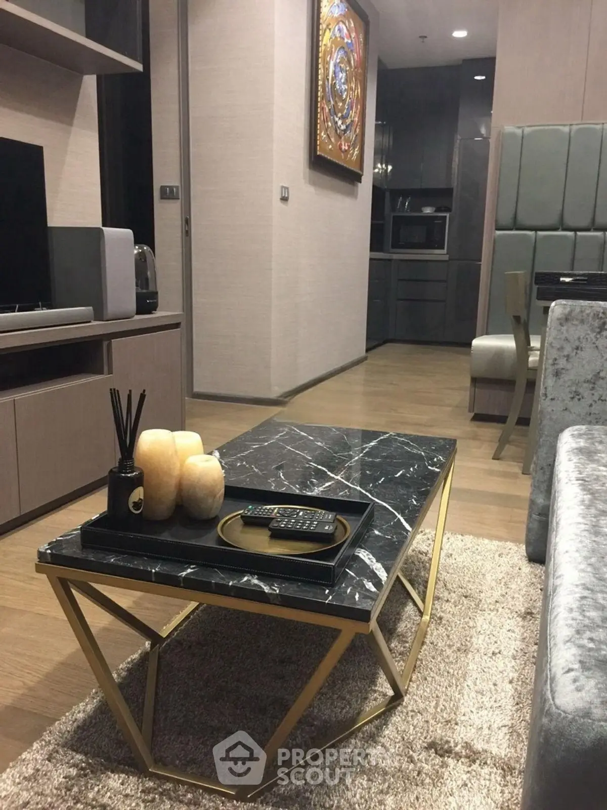 Modern living room with elegant marble coffee table and stylish decor