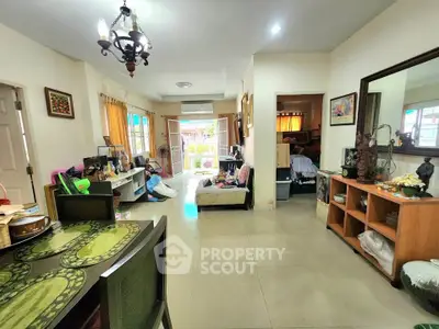 Spacious living room with elegant decor and ample natural light