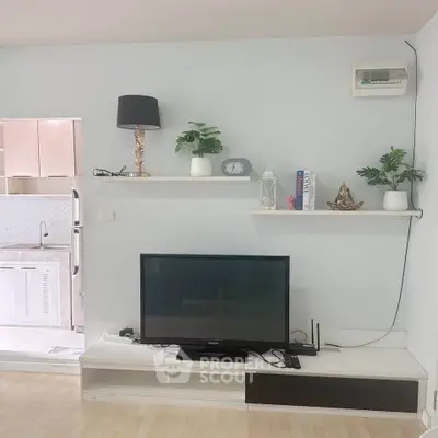 Modern living room with sleek TV setup and stylish decor