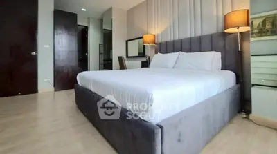 Spacious modern bedroom with elegant decor and cozy lighting