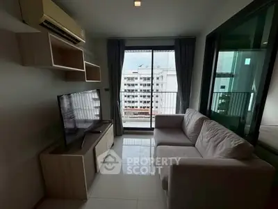 Modern living room with balcony view in high-rise apartment