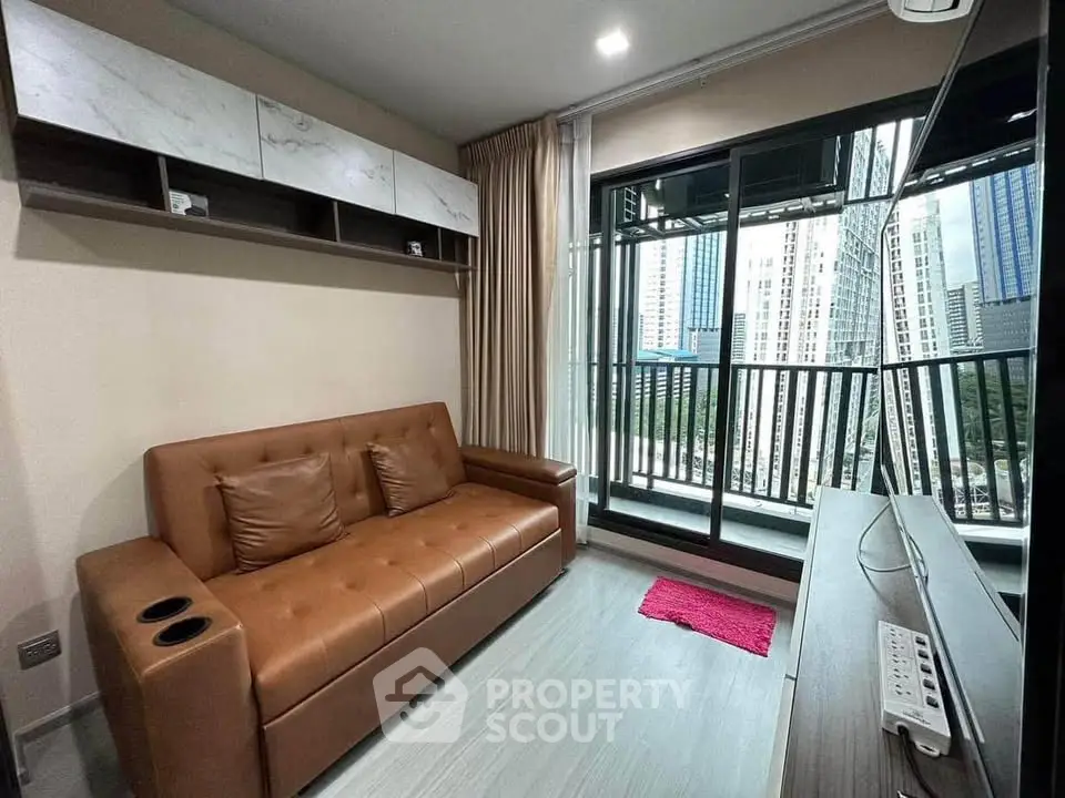 Modern living room with leather sofa and city view balcony in luxury apartment