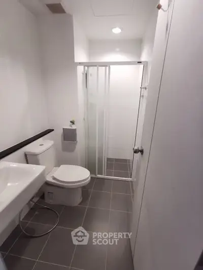 Modern bathroom with sleek design and glass shower enclosure