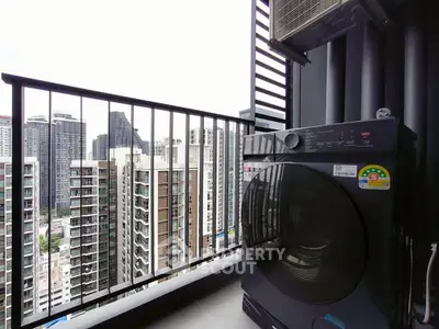 Modern balcony with city view and washing machine, perfect for urban living.