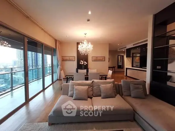 Luxurious living room with spacious balcony and city view