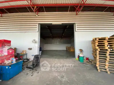 Spacious industrial warehouse with open floor plan and high ceilings