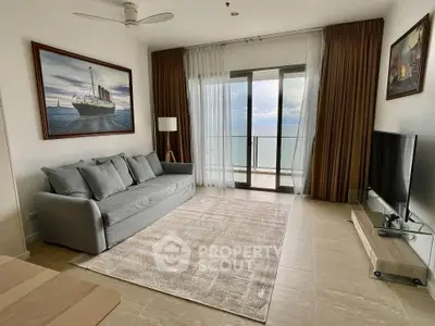 Spacious living room with ocean view and modern decor