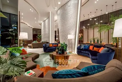 Luxurious modern living room with elegant decor and plush seating in a stylish apartment.