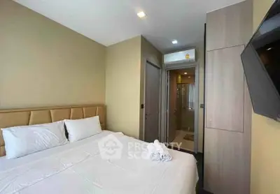 Modern bedroom with ensuite bathroom in a stylish apartment