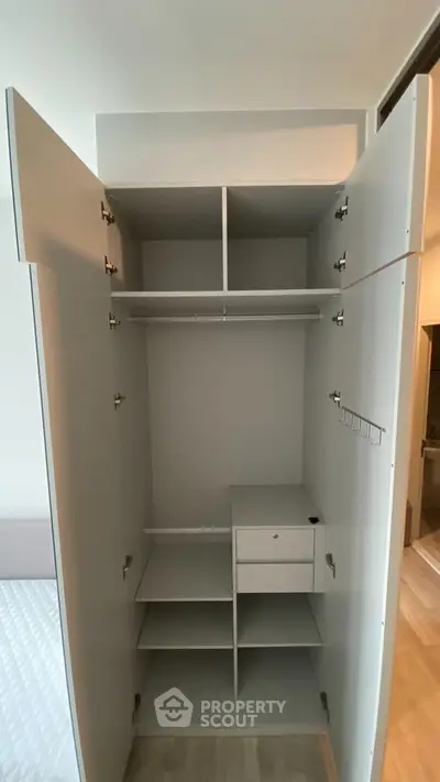 Spacious modern wardrobe with ample storage in a stylish bedroom