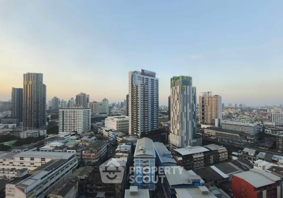 Stunning cityscape view showcasing modern high-rise buildings at sunset, perfect for urban living enthusiasts.