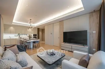 Luxurious open layout living room with modern kitchen and elegant decor
